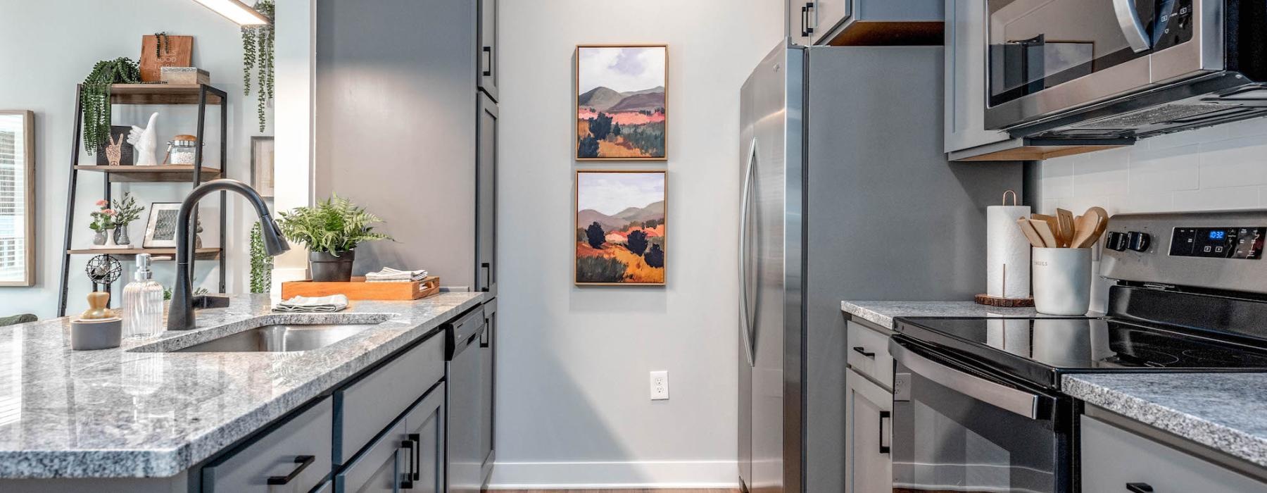 a kitchen with a stove and oven