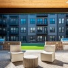 outside seating near lush green turf