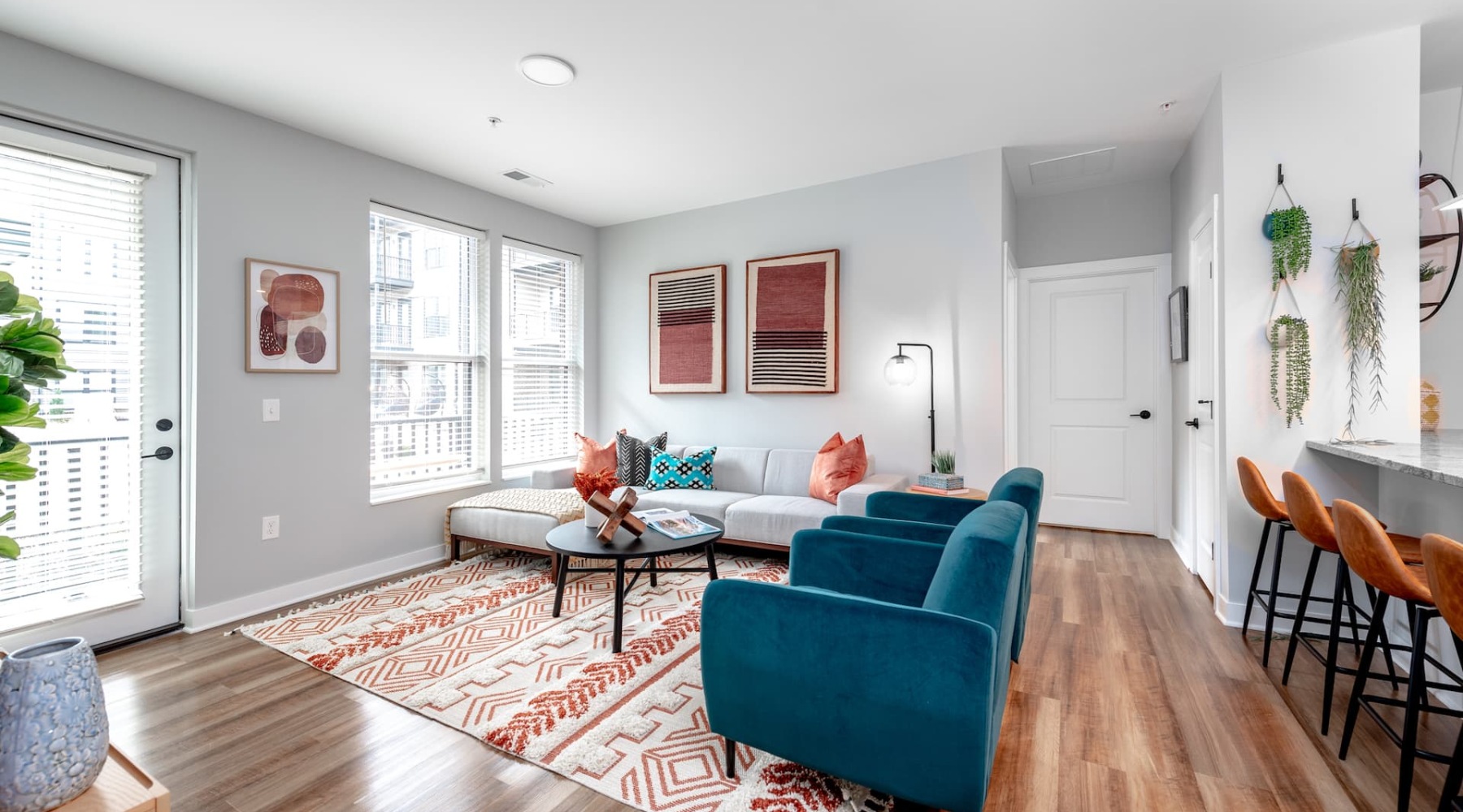 Located in Harrison West living room with easy to access spaces and ample lighting